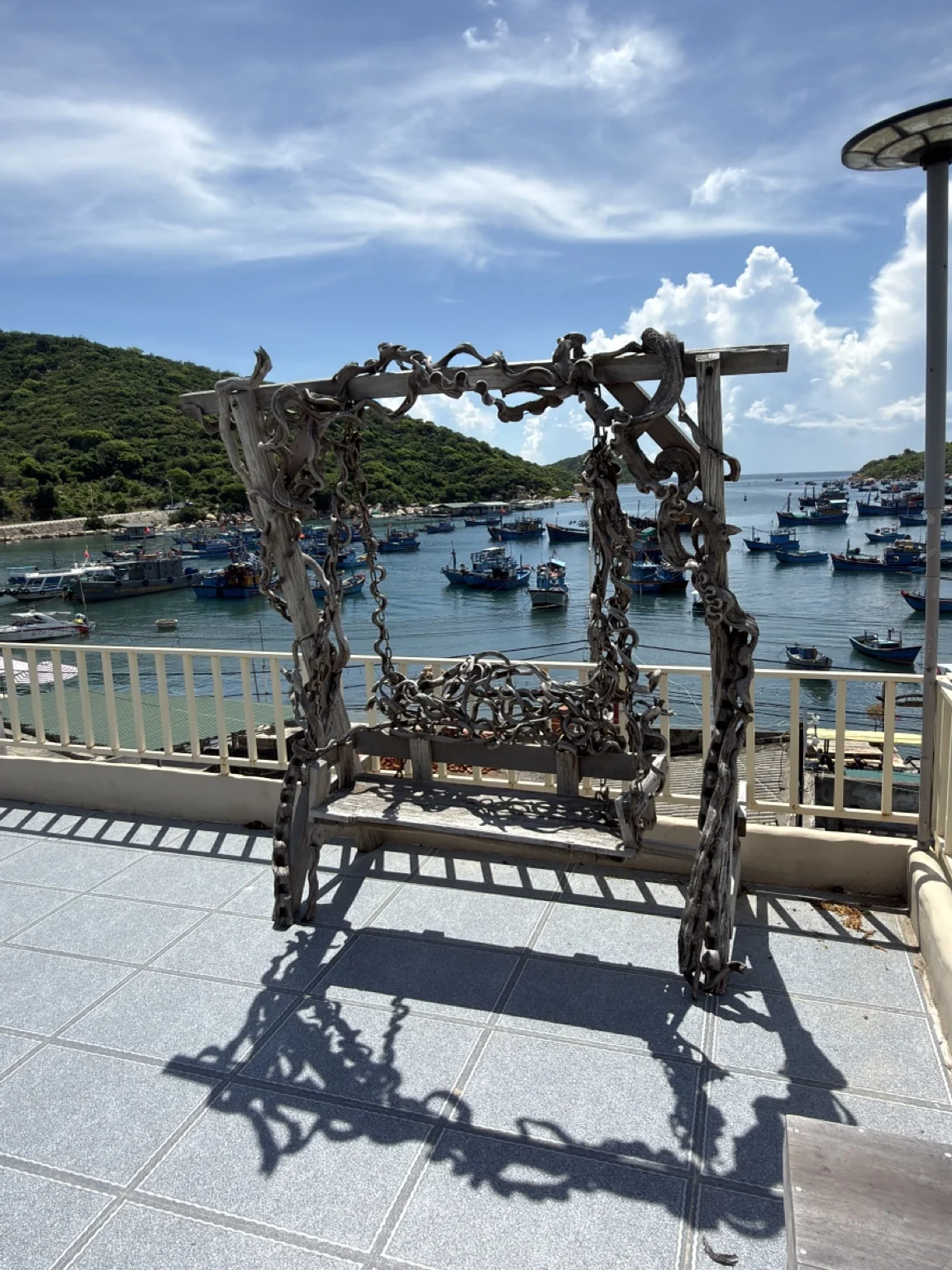 Terrace overlooking boats in Vĩnh Hy Bay